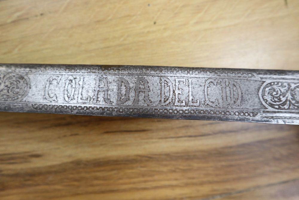 A Spanish Toledo short sword, with etched 58cm double-edged blade